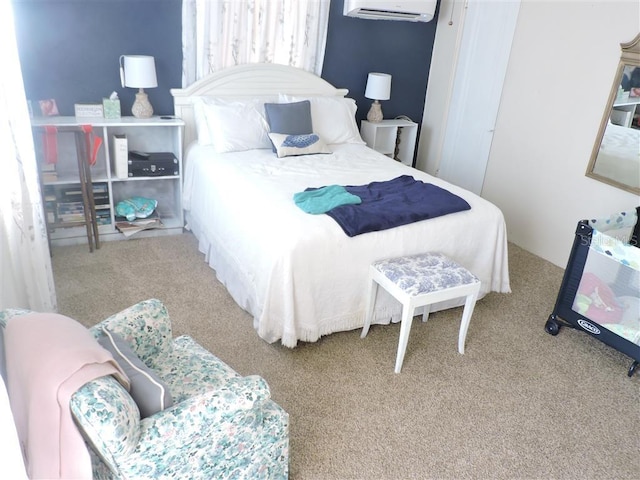 bedroom with carpet flooring and a wall mounted air conditioner