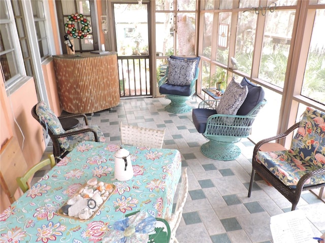 sunroom / solarium featuring a wealth of natural light