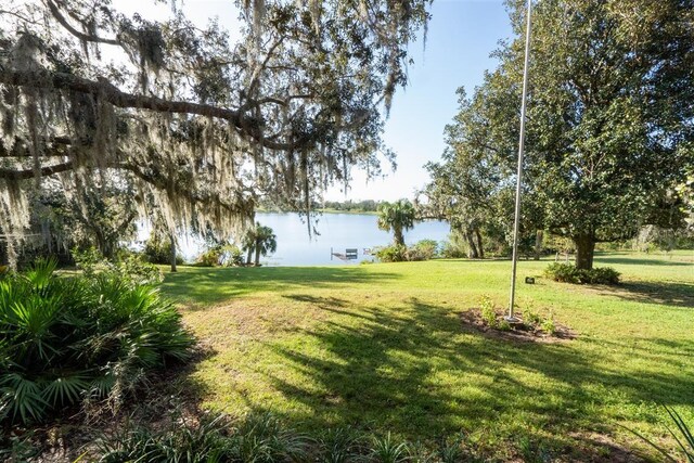 view of yard with a water view