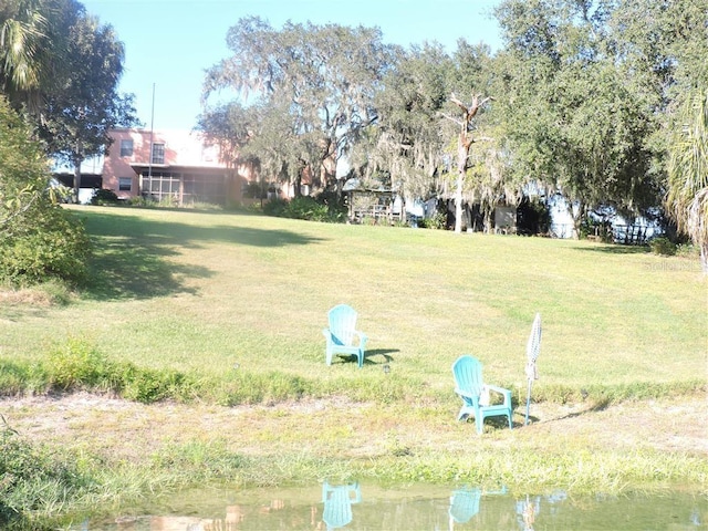 view of yard with a water view