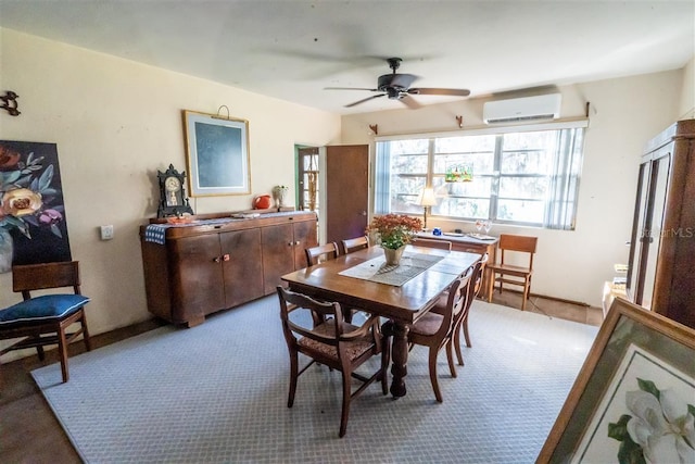 dining room featuring a wall unit AC, light colored carpet, and ceiling fan