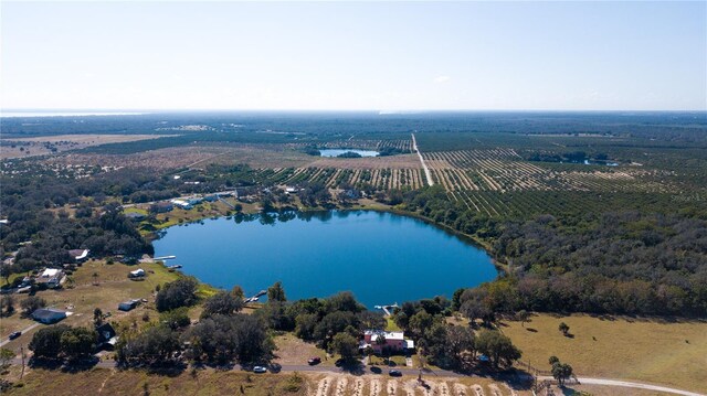 aerial view featuring a rural view and a water view