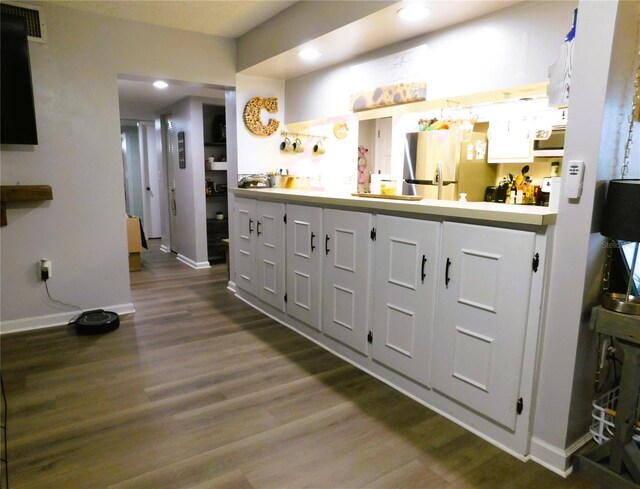 bathroom featuring wood-type flooring