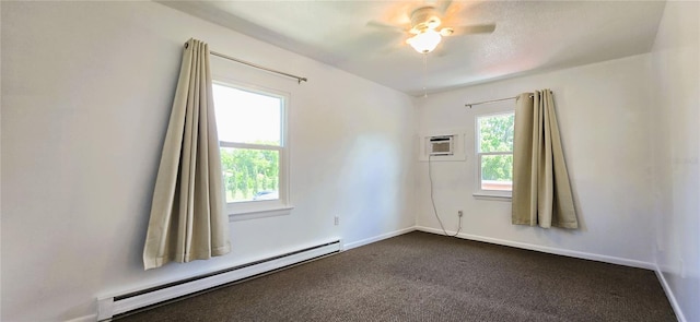 carpeted spare room with a baseboard radiator and a wall mounted AC