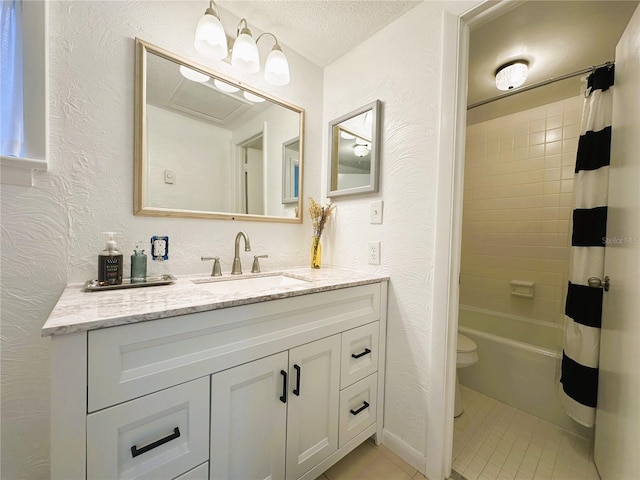 full bathroom featuring tile patterned floors, toilet, a textured ceiling, vanity, and shower / bath combo with shower curtain