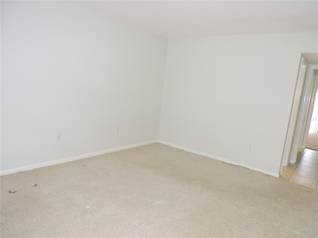 empty room featuring light tile floors