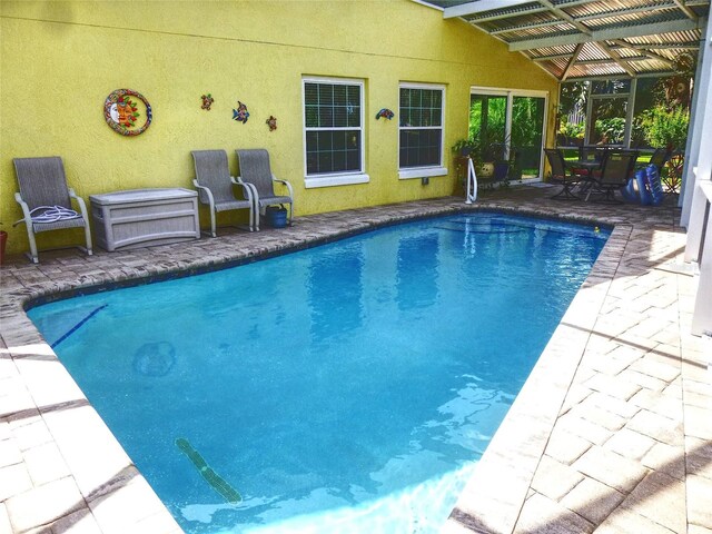 view of pool featuring a patio area