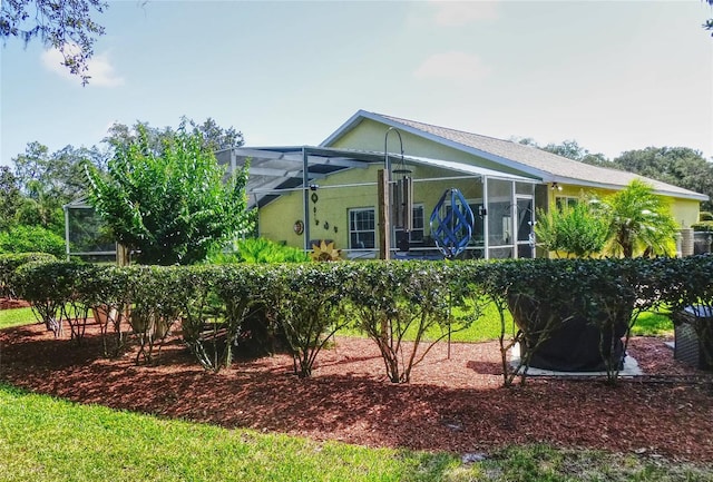 exterior space featuring a lanai