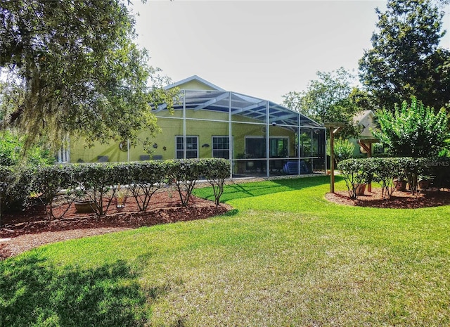 view of yard with a lanai