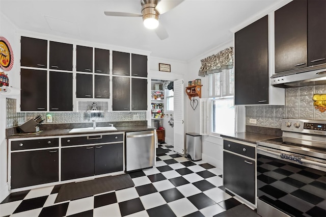 kitchen featuring backsplash, crown molding, ceiling fan, and stainless steel appliances