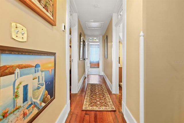 hallway featuring hardwood / wood-style floors