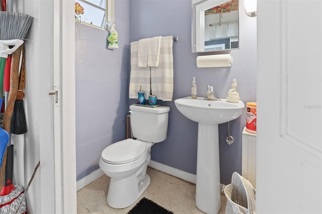 bathroom featuring toilet