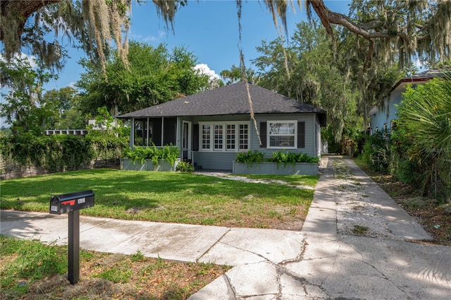 view of front facade with a front lawn