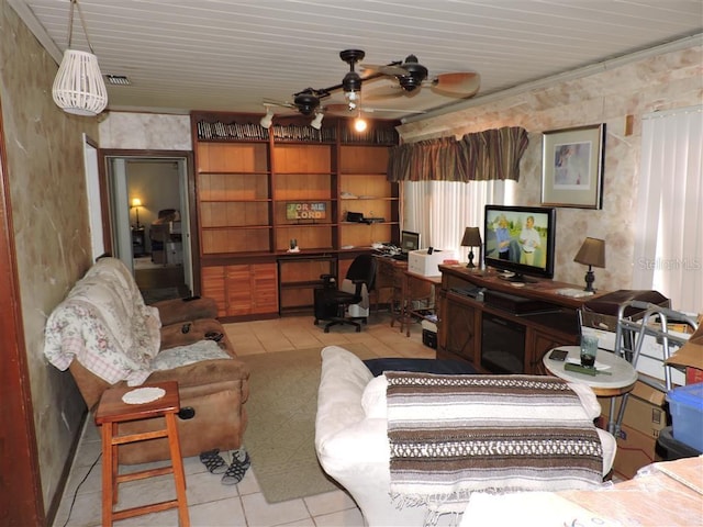 office space featuring built in desk and ceiling fan