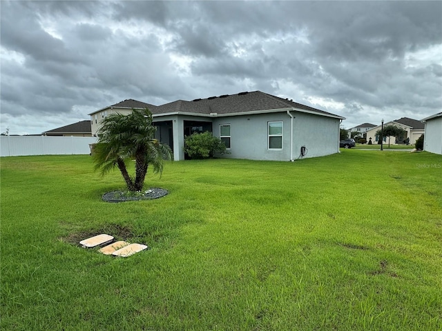 exterior space with a yard