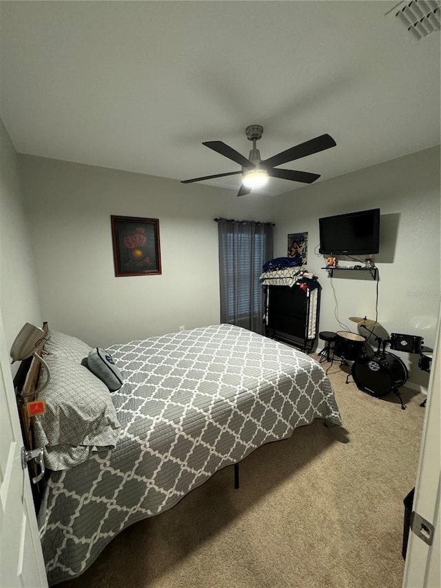 carpeted bedroom with ceiling fan