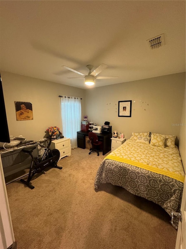 carpeted bedroom featuring ceiling fan