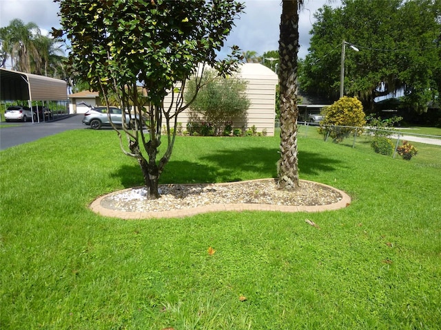 view of yard with a carport