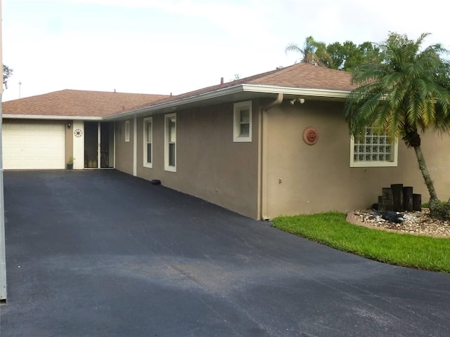 exterior space with a garage