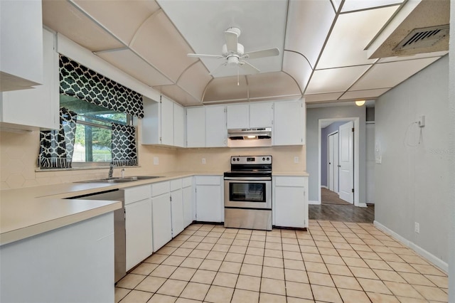 kitchen featuring white cabinetry, visible vents, stainless steel electric stove, and light countertops