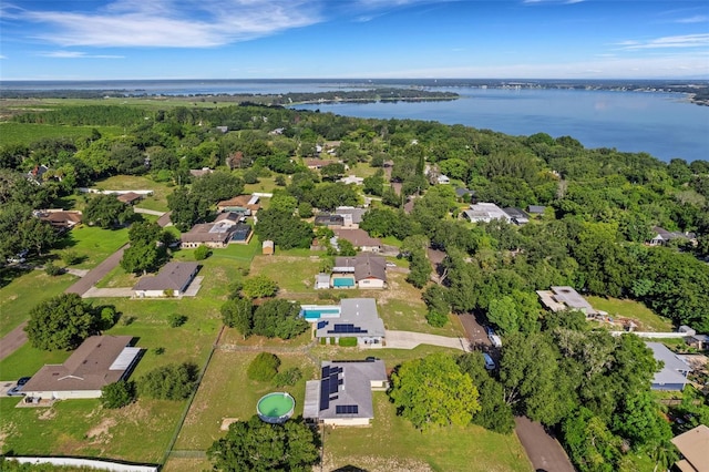 bird's eye view with a residential view and a water view