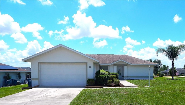 ranch-style house with a garage and a front lawn