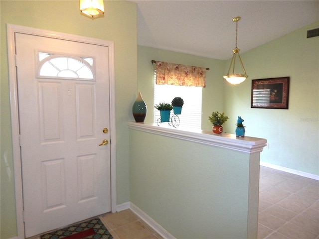 entrance foyer with tile patterned flooring