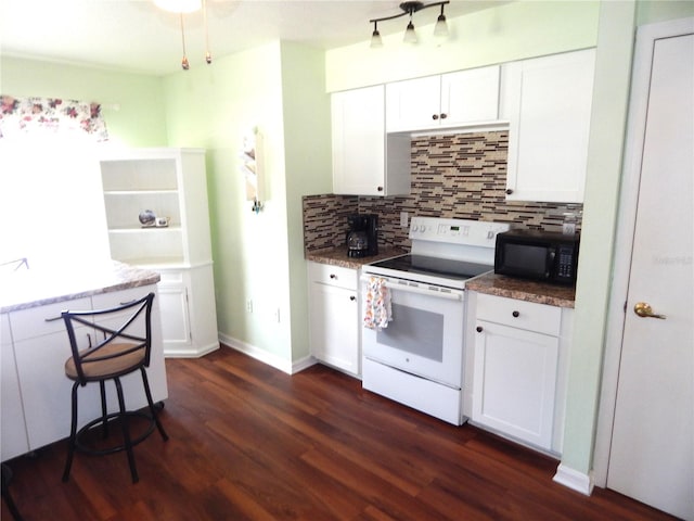 kitchen featuring decorative backsplash, white cabinets, dark hardwood / wood-style floors, and white electric range