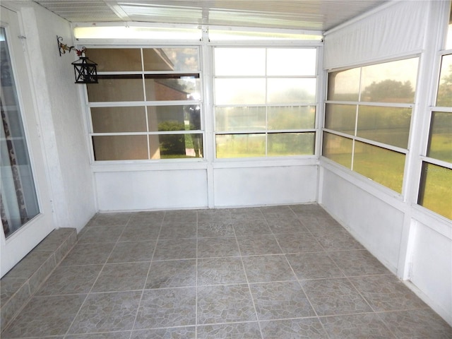 unfurnished sunroom with a healthy amount of sunlight