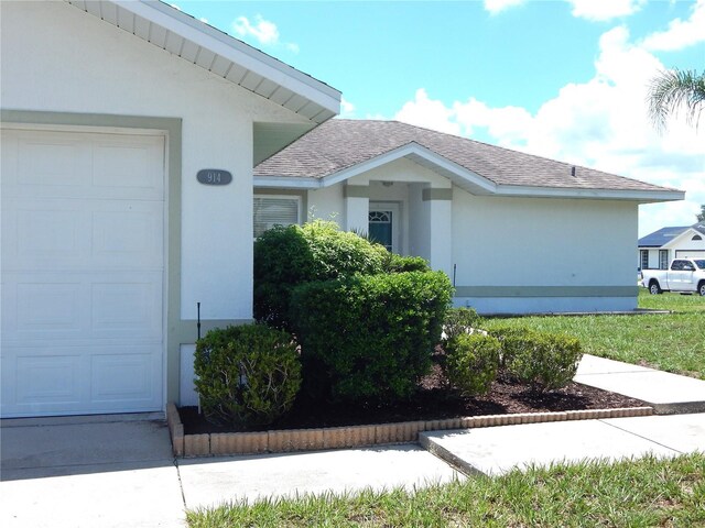 exterior space with a garage