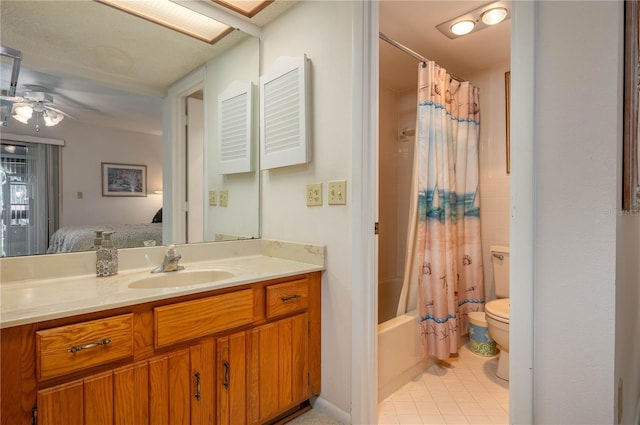 ensuite bathroom with a ceiling fan, toilet, ensuite bath, tile patterned flooring, and vanity