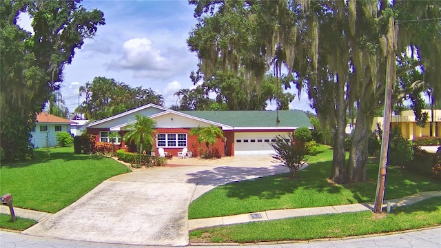 ranch-style home with a front lawn and a garage