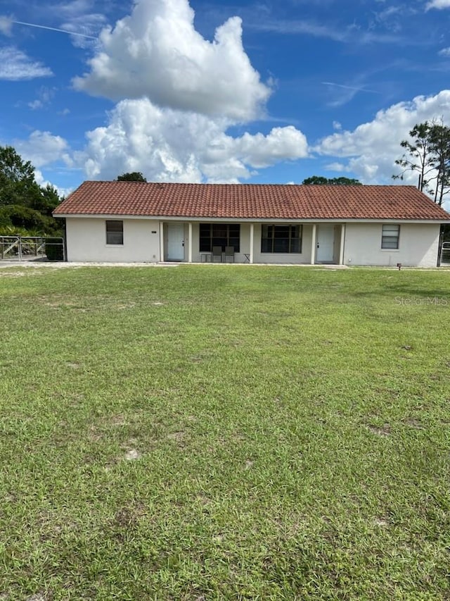 view of front of home with a front yard