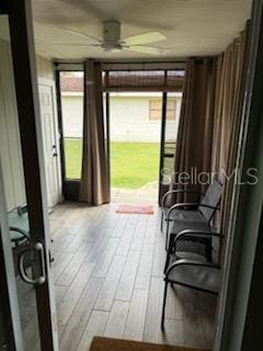 entryway featuring light hardwood / wood-style flooring and ceiling fan