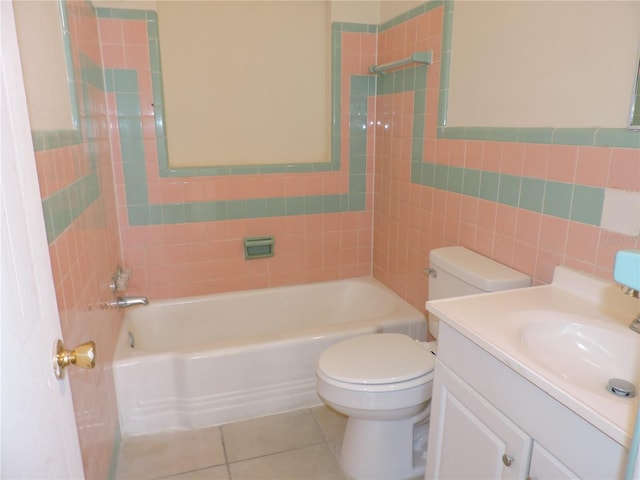 full bathroom featuring tile walls, tile patterned flooring, and tiled shower / bath