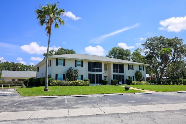 711 Springer Dr Unit 2, Lake Wales, FL 33853 - view of building exterior with uncovered parking