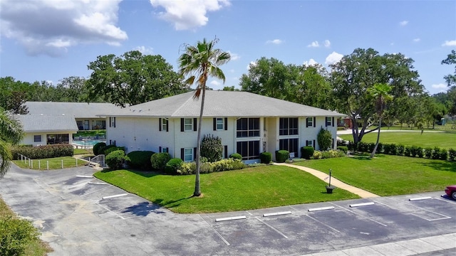 711 Springer Dr Unit 2, Lake Wales, FL 33853 - view of building exterior featuring uncovered parking