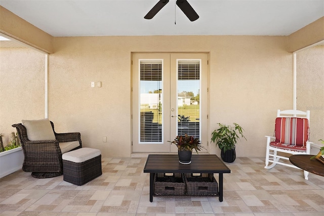 view of patio with ceiling fan and french doors