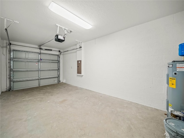 garage featuring electric panel, water heater, and a garage door opener