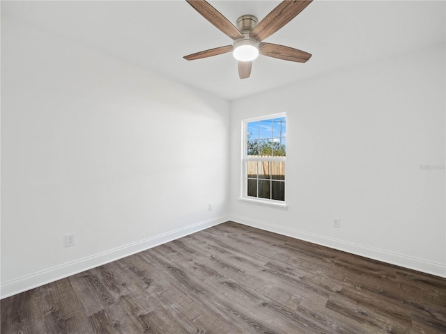 spare room featuring ceiling fan and hardwood / wood-style floors