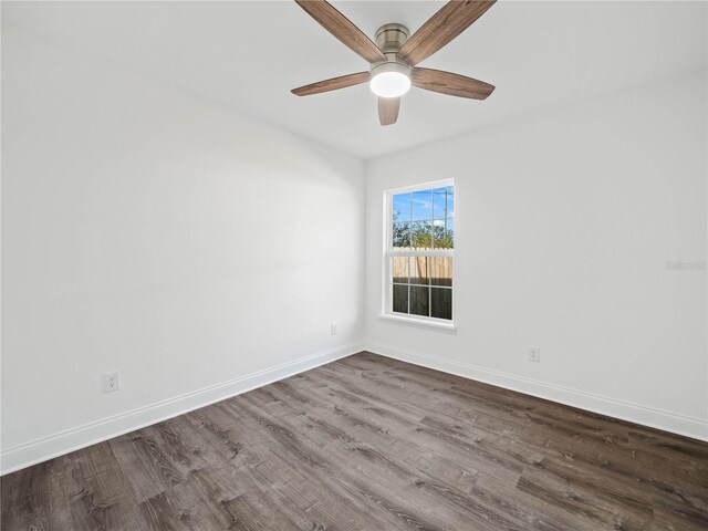 815 S Seminole Ave, Fort Meade, FL 33841 - spare room featuring ceiling fan and dark wood finished floors
