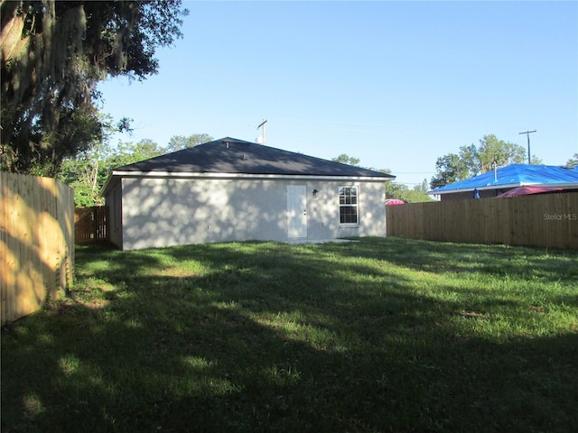 815 S Seminole Ave, Fort Meade, FL 33841 - rear view of house featuring a fenced backyard