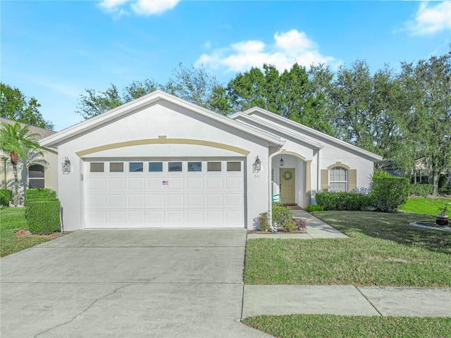 ranch-style home featuring a garage and a front lawn