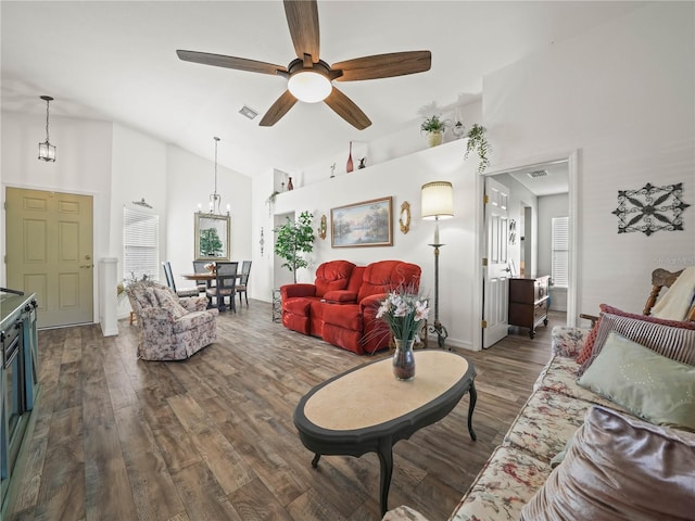 341 Lake Suzanne Dr, Lake Wales, FL 33859 - living area with high vaulted ceiling, wood finished floors, ceiling fan, and a chandelier