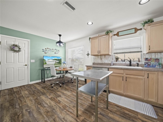 kitchen featuring sink, pendant lighting, dark hardwood / wood-style floors, and light brown cabinets