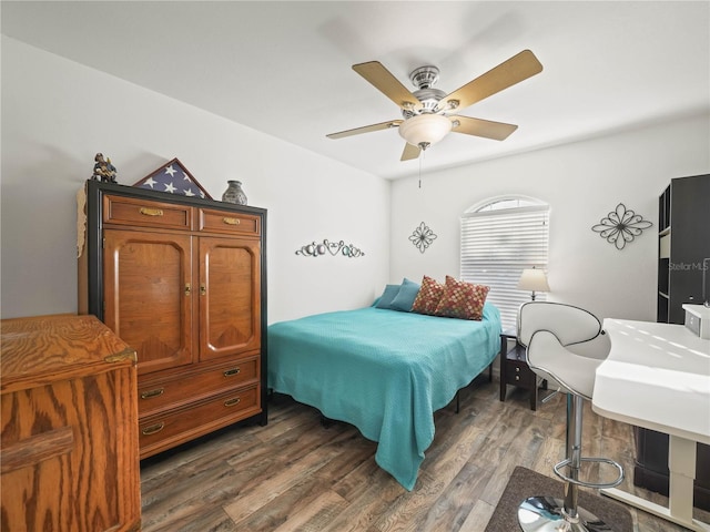 bedroom featuring dark hardwood / wood-style floors and ceiling fan