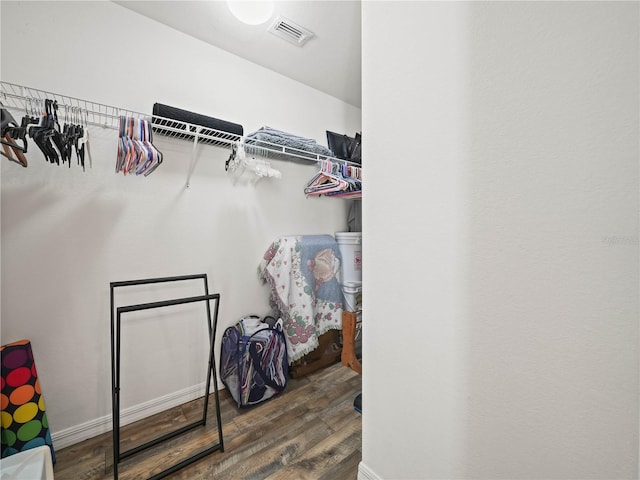 341 Lake Suzanne Dr, Lake Wales, FL 33859 - spacious closet featuring wood finished floors