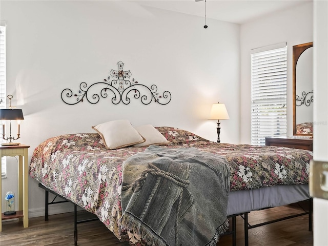 bedroom with wood-type flooring