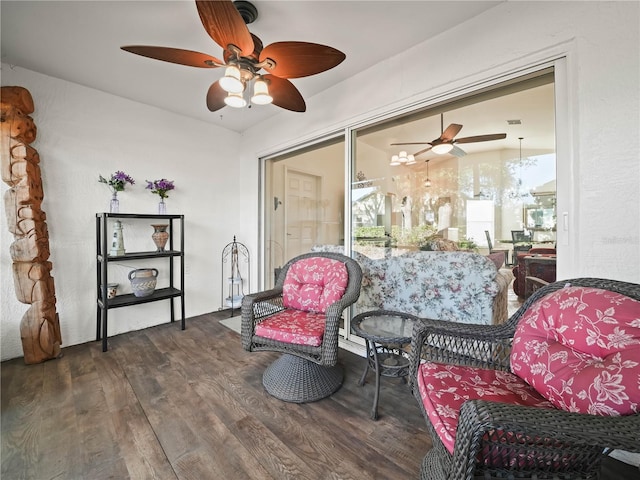 sitting room with dark hardwood / wood-style floors