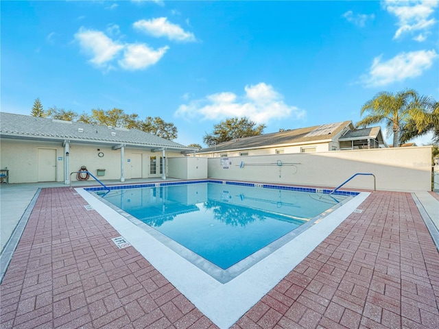 view of pool with a patio area